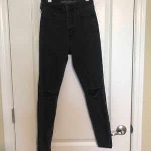 Black American eagle jeans with knee rips
